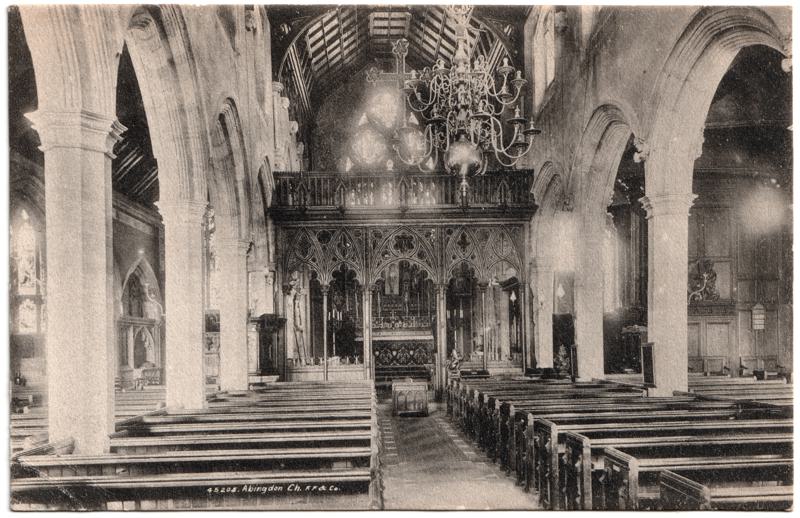 The front of an old postcard. The postcard is of Abingdon: St. Helen's Church and the Almshouses