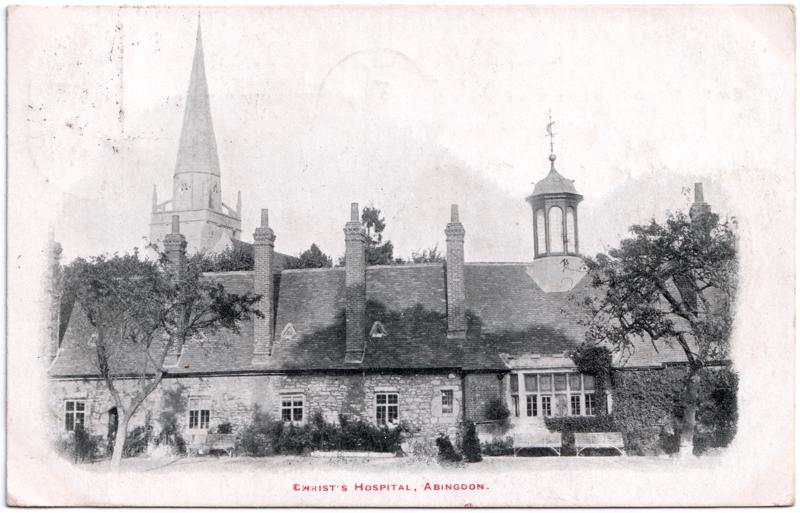 The front of an old postcard. The postcard is of Abingdon: St. Helen's Church and the Almshouses