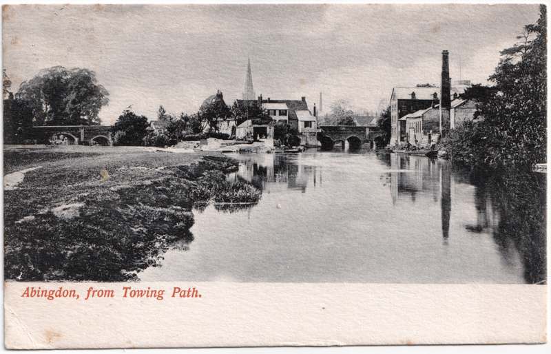 The front of an old postcard. The postcard is of Abingdon: The Bridge