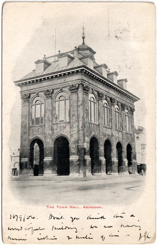 The front of an old postcard. The postcard is of Abingdon: Marketplace