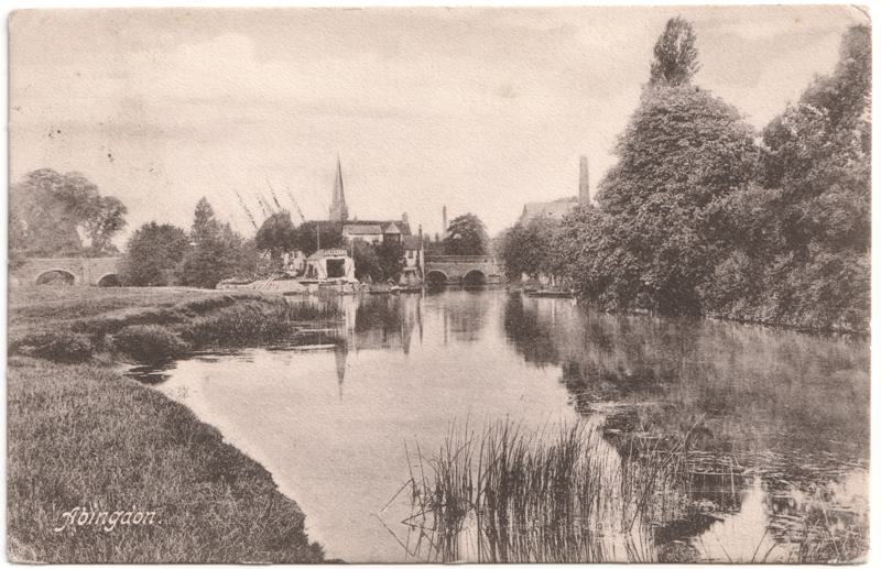 The front of an old postcard. The postcard is of Abingdon: The Bridge