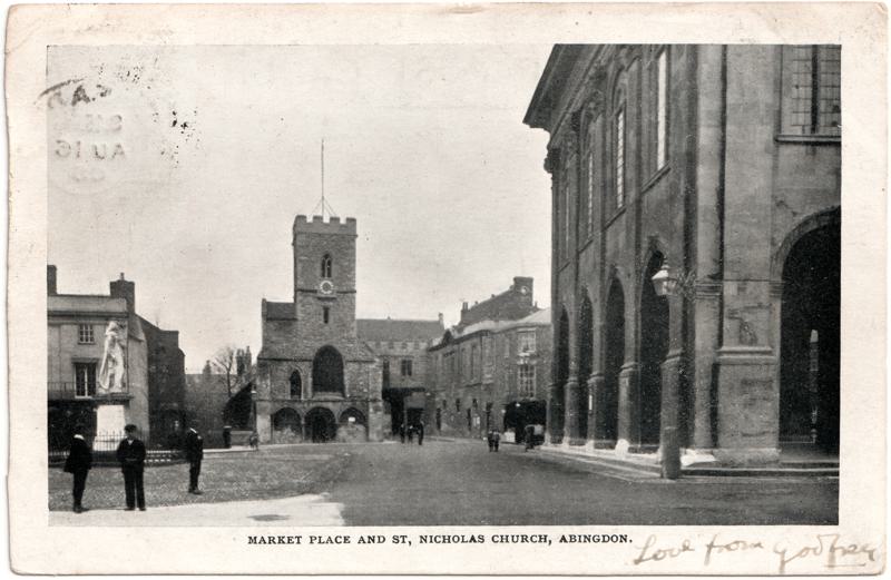 The front of an old postcard. The postcard is of Abingdon: Marketplace