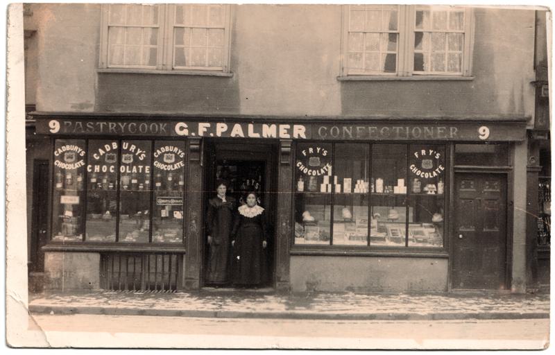 The front of an old postcard. The postcard is of Abingdon: Marketplace