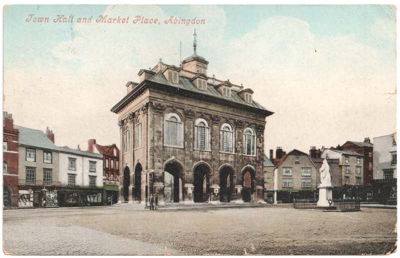 The front of an old postcard. The postcard is of Abingdon: Marketplace