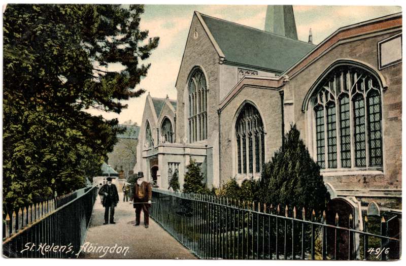 The front of an old postcard. The postcard is of Abingdon: St. Helen's Church and the Almshouses