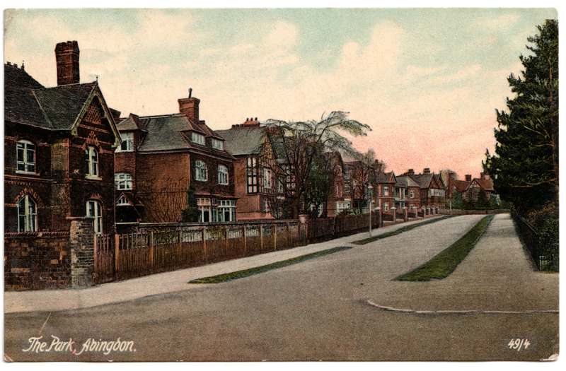 The front of an old postcard. The postcard is of Abingdon: Albert Park and Abingdon School