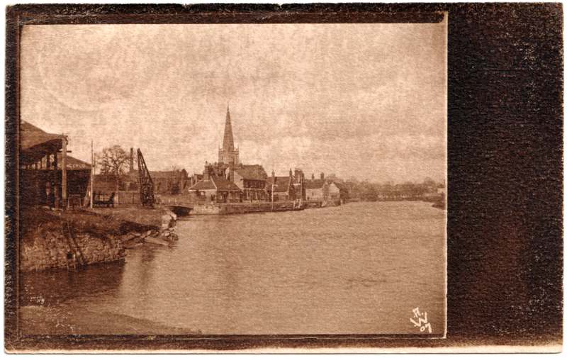 The front of an old postcard. The postcard is of Abingdon: St. Helen's Wharf