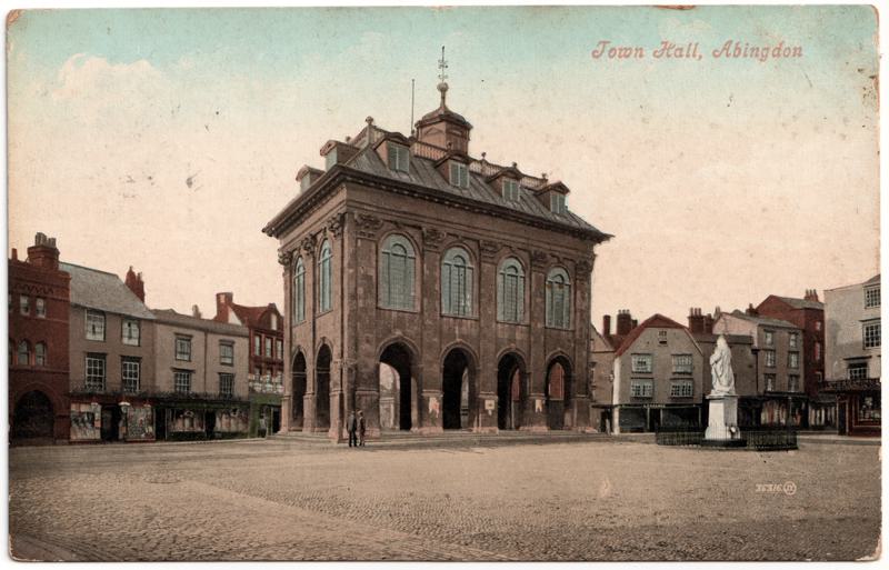 The front of an old postcard. The postcard is of Abingdon: Marketplace