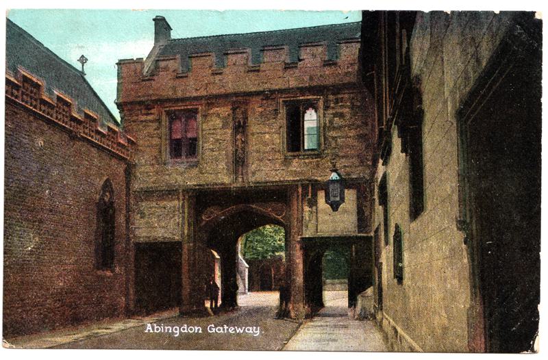 The front of an old postcard. The postcard is of Abingdon: Abbey Gateway