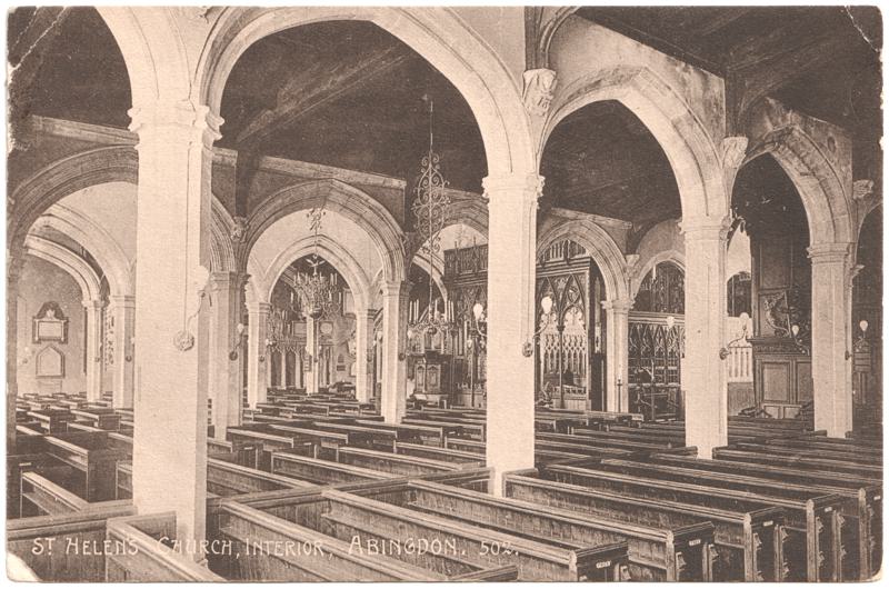 The front of an old postcard. The postcard is of Abingdon: St. Helen's Church and the Almshouses