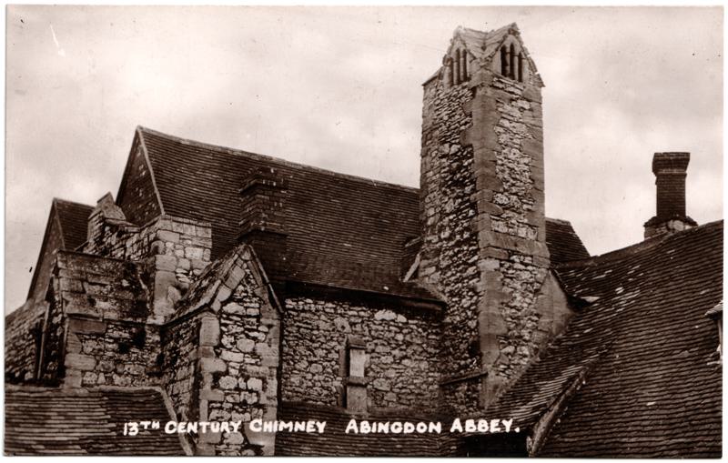 The front of an old postcard. The postcard is of Abingdon: The Abbey Buildings