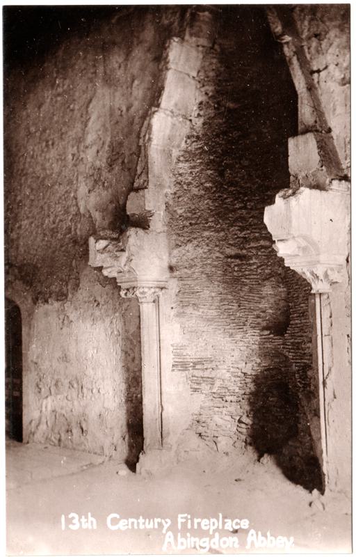 The front of an old postcard. The postcard is of Abingdon: The Abbey Buildings