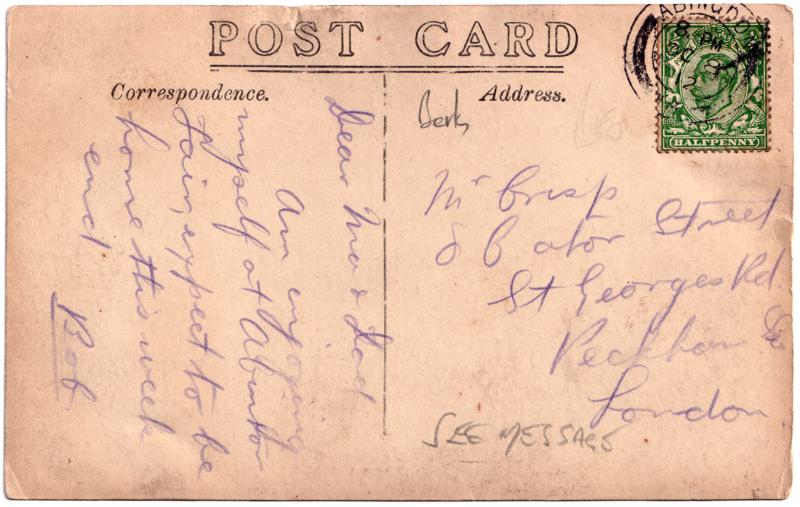 The front of an old postcard. The postcard is of Abingdon: Town Centre Streets