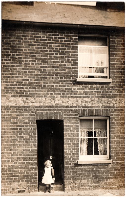 The front of an old postcard. The postcard is of Abingdon: Other Streets