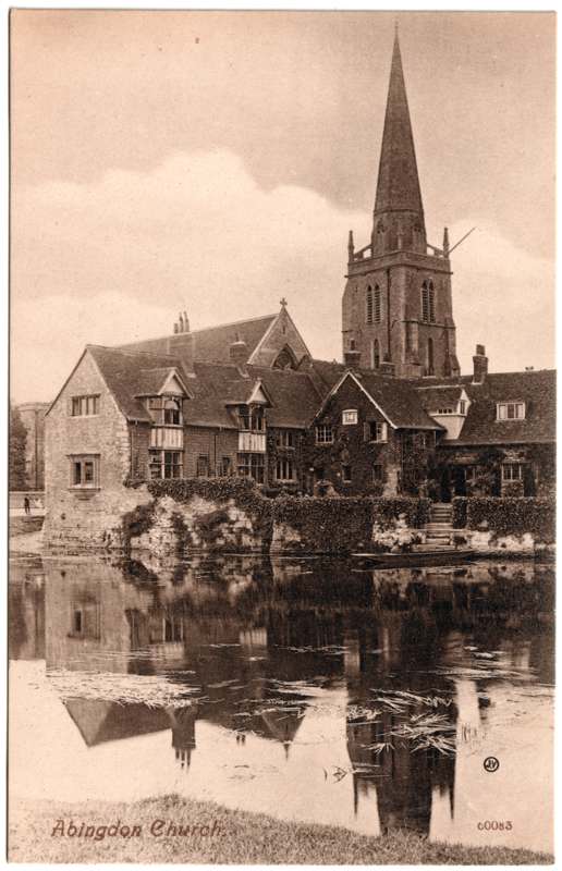 The front of an old postcard. The postcard is of Abingdon: St. Helen's Church and the Almshouses