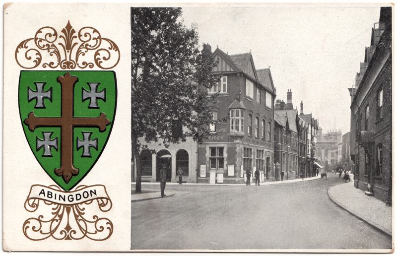 The front of an old postcard. The postcard is of Abingdon: Town Centre Streets