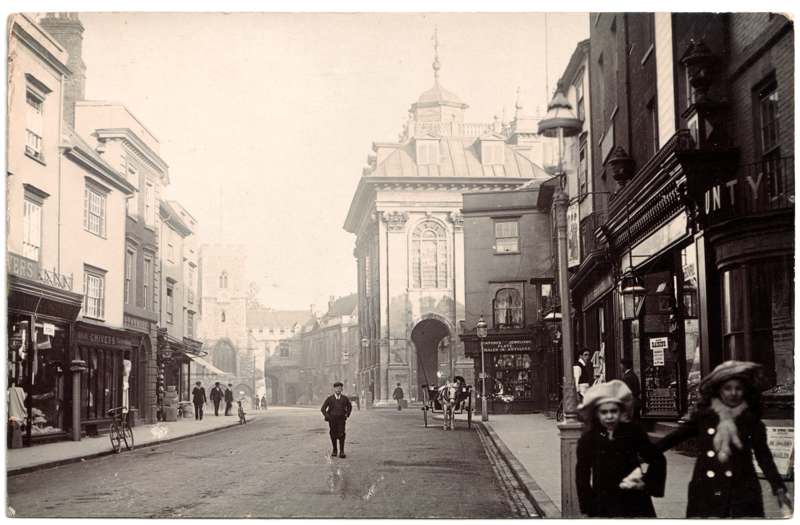 The front of an old postcard. The postcard is of Abingdon: