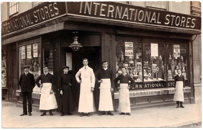 The front of an old postcard. The postcard is of Abingdon: Marketplace
