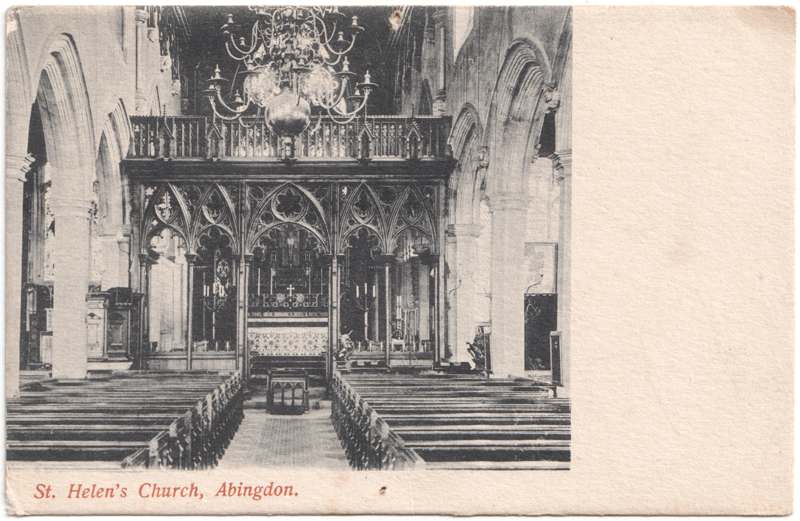 The front of an old postcard. The postcard is of Abingdon: St. Helen's Church and the Almshouses
