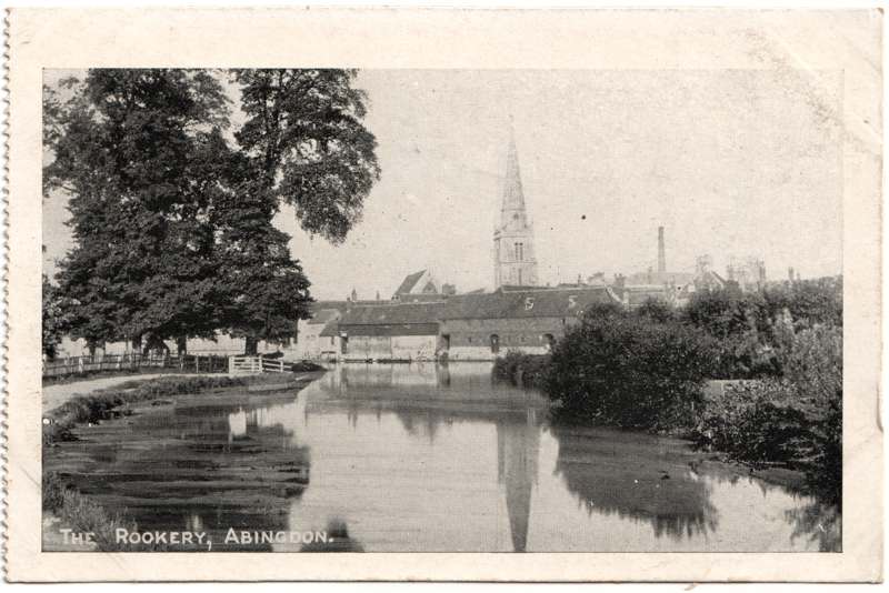The front of an old postcard. The postcard is of Abingdon: St. Helen's from the Bridge