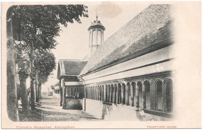 The front of an old postcard. The postcard is of Abingdon: St. Helen's Church and the Almshouses