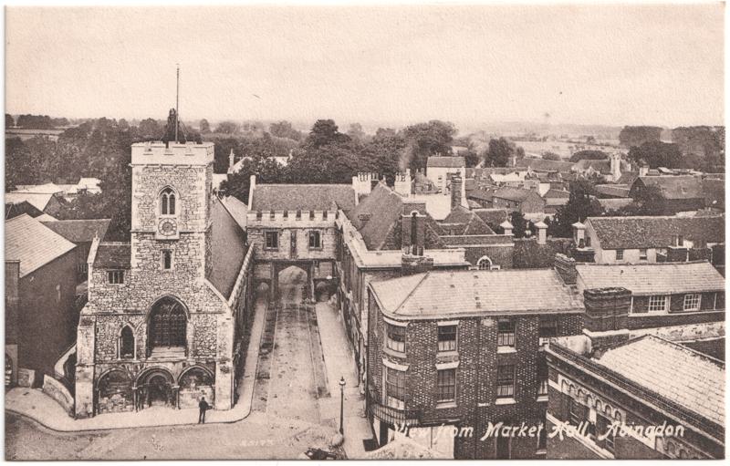The front of an old postcard. The postcard is of Abingdon: Abbey Gateway