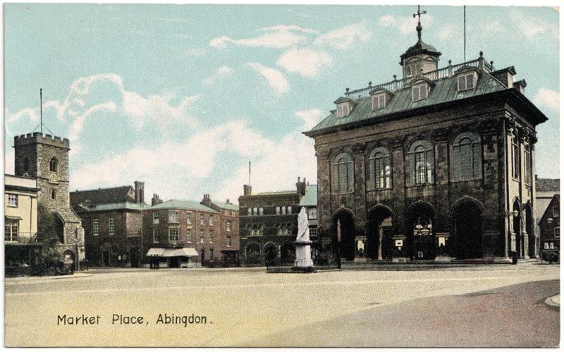 The front of an old postcard. The postcard is of Abingdon: Marketplace