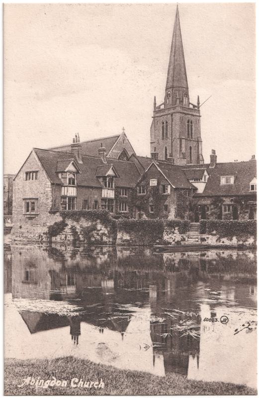 The front of an old postcard. The postcard is of Abingdon: St. Helen's Church and the Almshouses